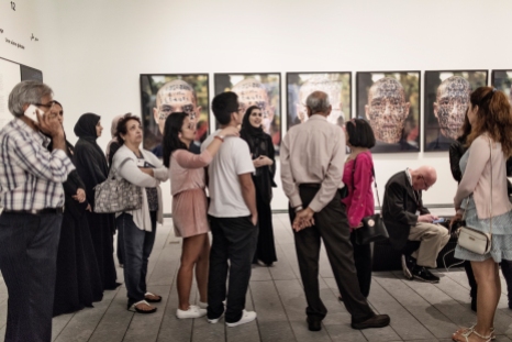ABU DHABI, UNITED ARAB EMIRATES-November 13, 2017: Visitors in the final gallery 'A Global Stage' listen to a Louvre Guide. Louvre Abu Dhabi CREDIT: Katarina Premfors/The New York Times
